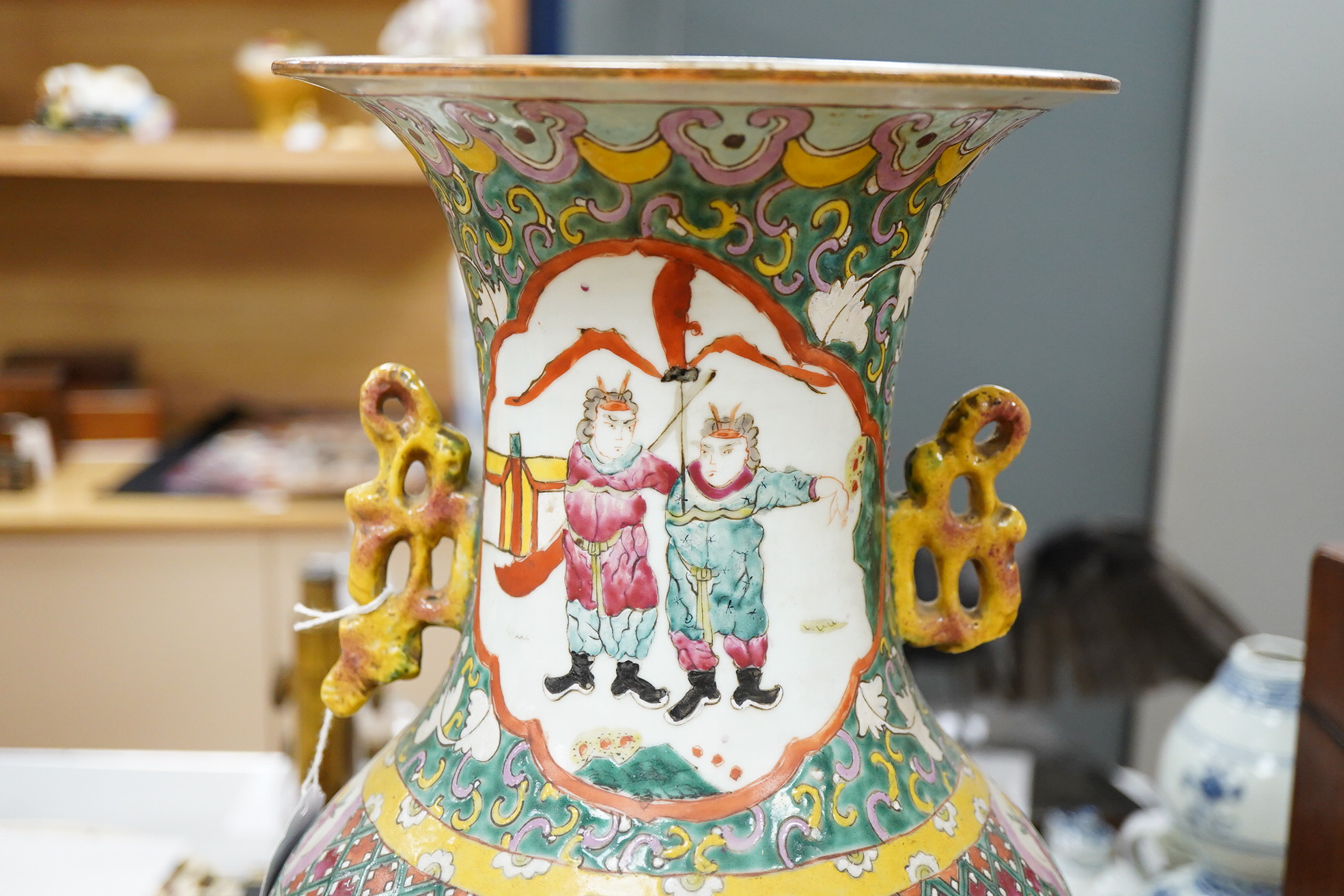 A large Chinese Canton vase enamelled with figures, 57cm high